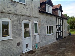 Deteriorated farmhouse walls allowing water penetration in the building